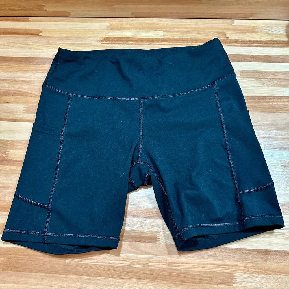 Black Bike Shorts with Stretchy Material and Mid-Thigh Length